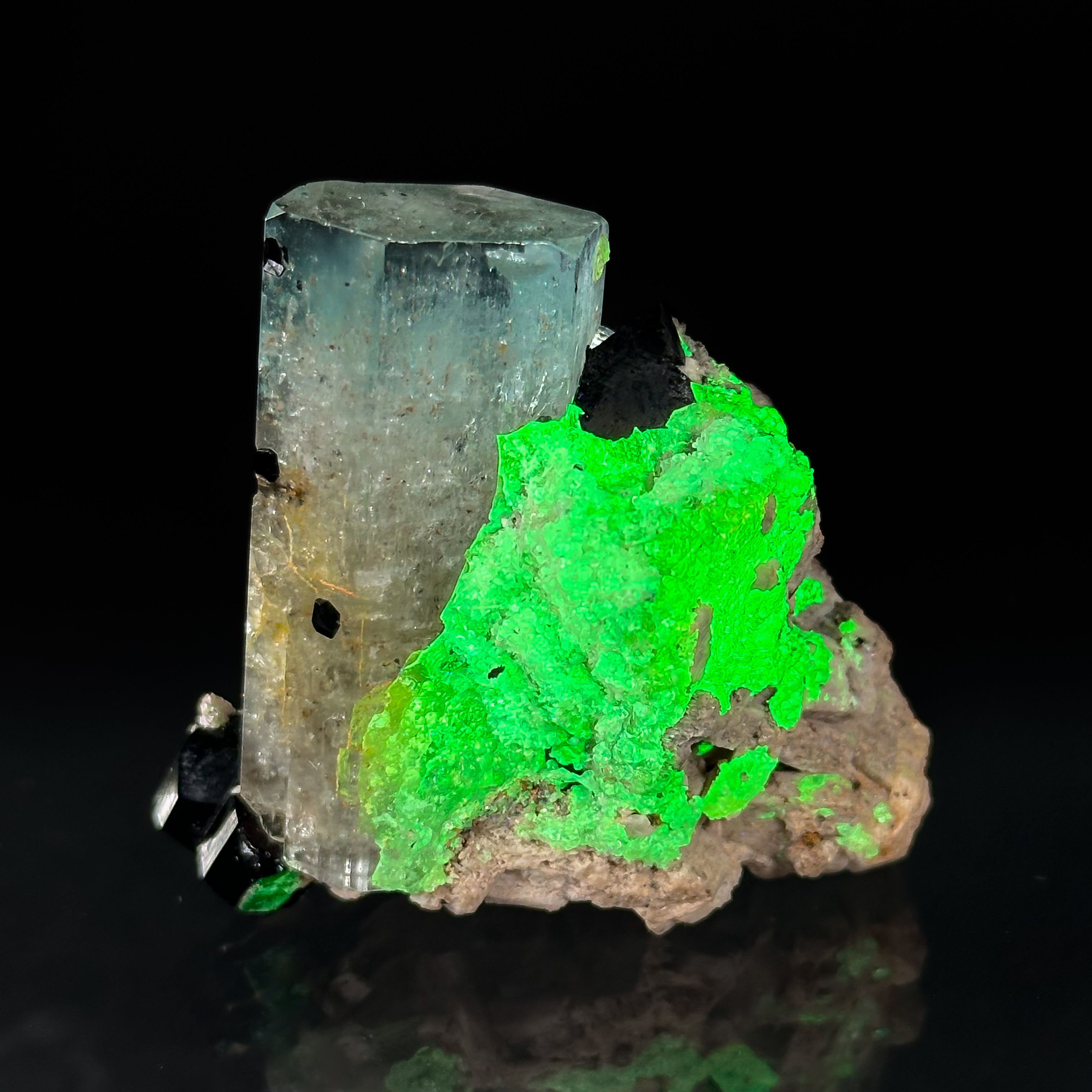 Beryl var. Aquamarine, Opal var. Hyalite, Schorl, on Feldspar