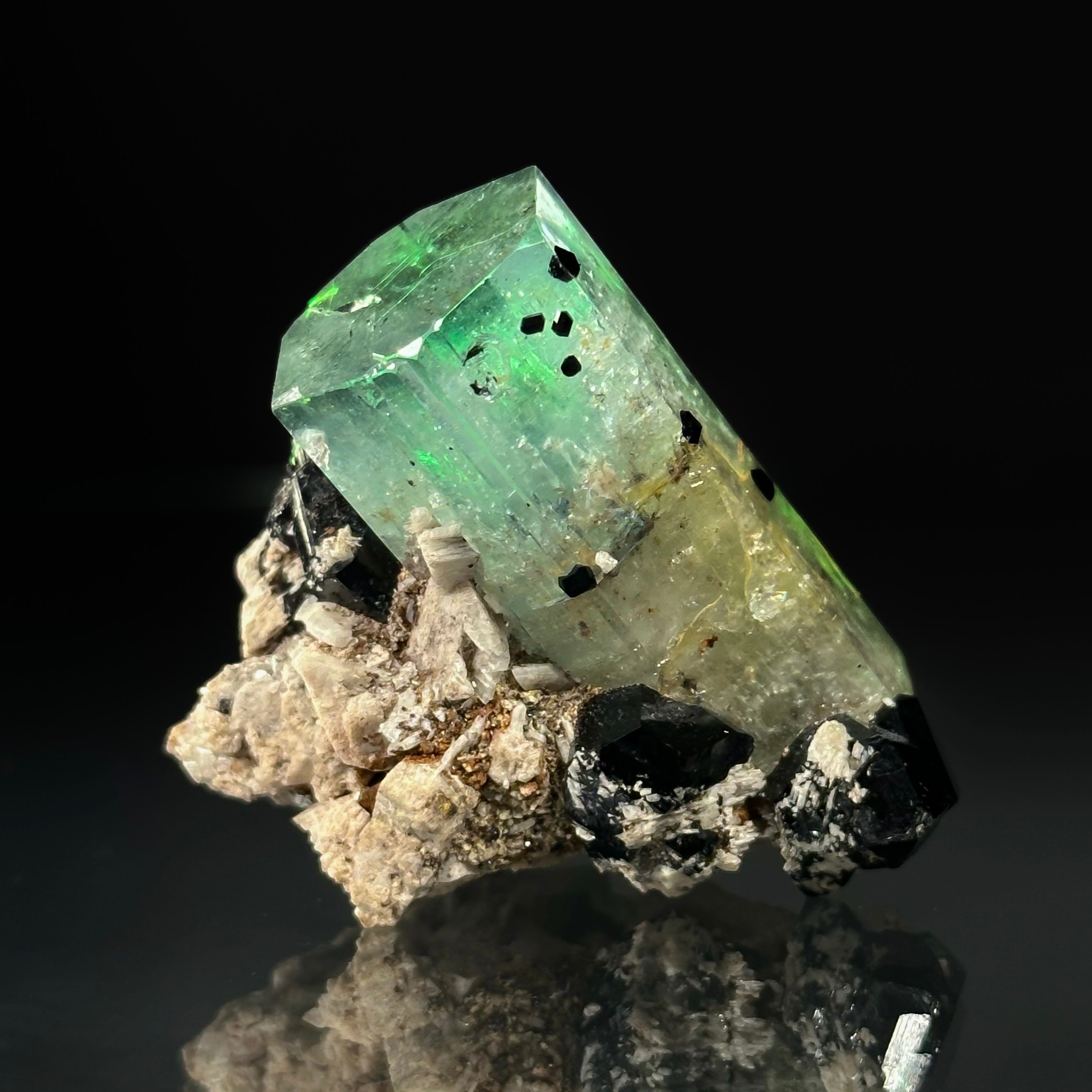 Beryl var. Aquamarine, Opal var. Hyalite, Schorl, on Feldspar