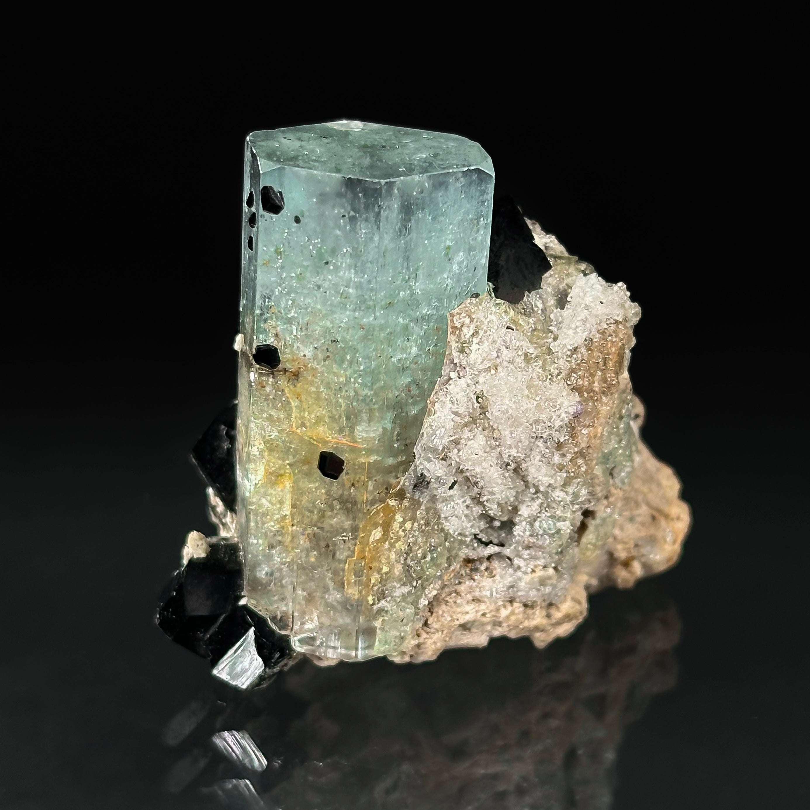 Beryl var. Aquamarine, Opal var. Hyalite, Schorl, on Feldspar