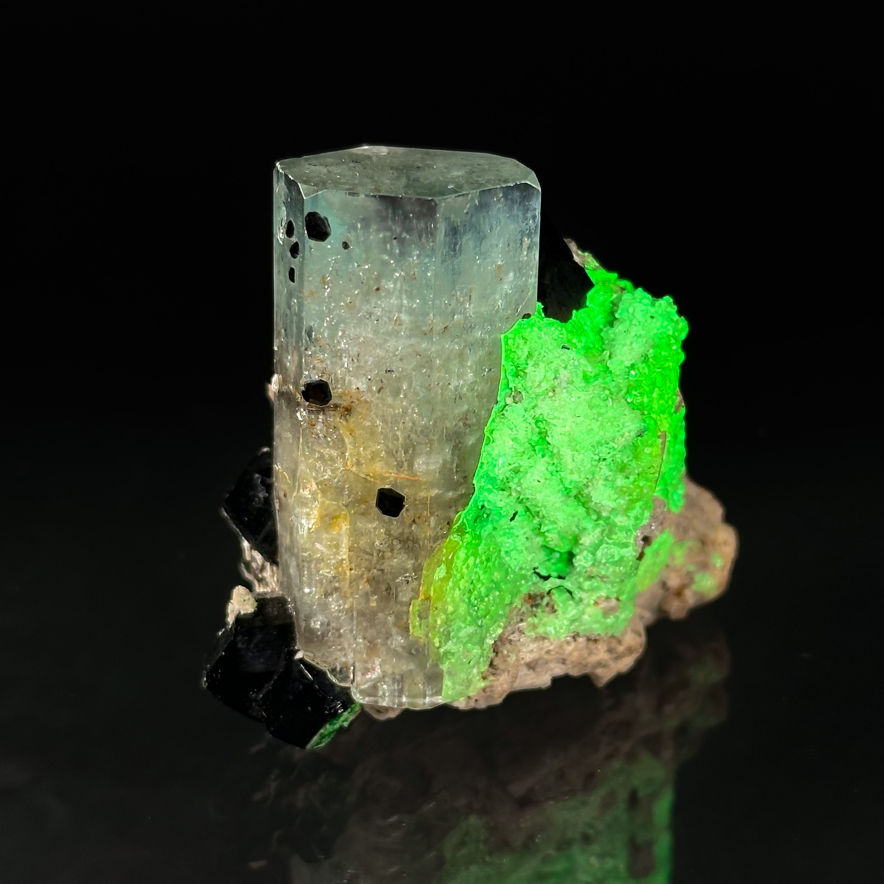 Beryl var. Aquamarine, Opal var. Hyalite, Schorl, on Feldspar