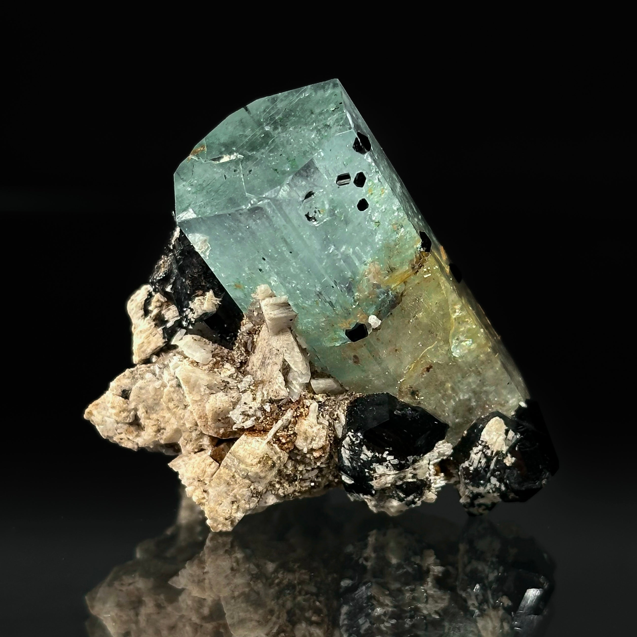 Beryl var. Aquamarine, Opal var. Hyalite, Schorl, on Feldspar