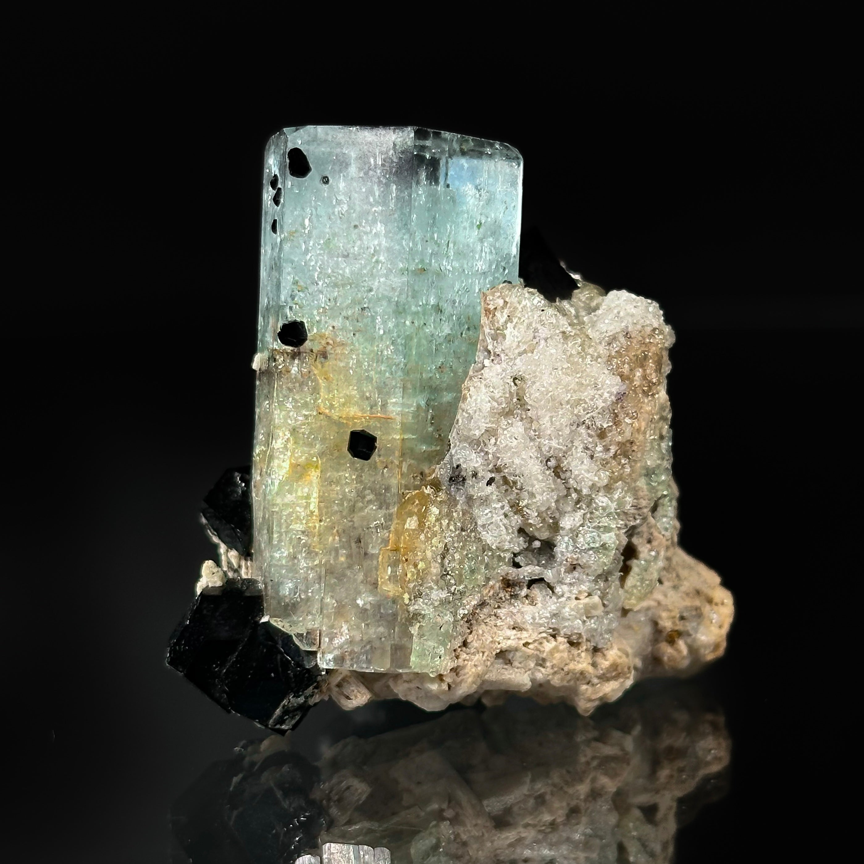 Beryl var. Aquamarine, Opal var. Hyalite, Schorl, on Feldspar